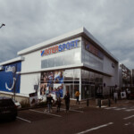 intersport-habillage-point-de-vente-covering-adhesif-champagne