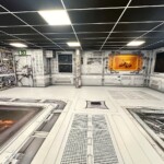 Habillage adhésif de sol à 360° pour le vaisseau spatial de l'escape game UIMM Lyon 8.